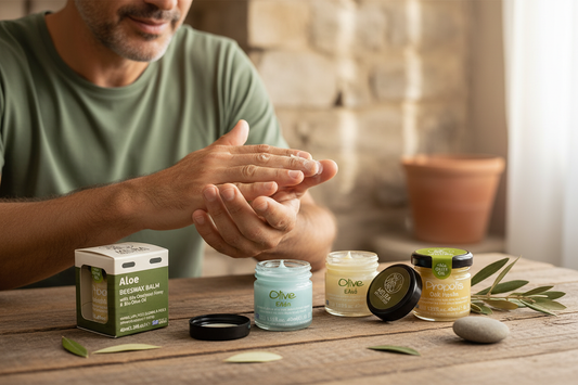 Father applying Melira beeswax balm to his hands with product tins nearby