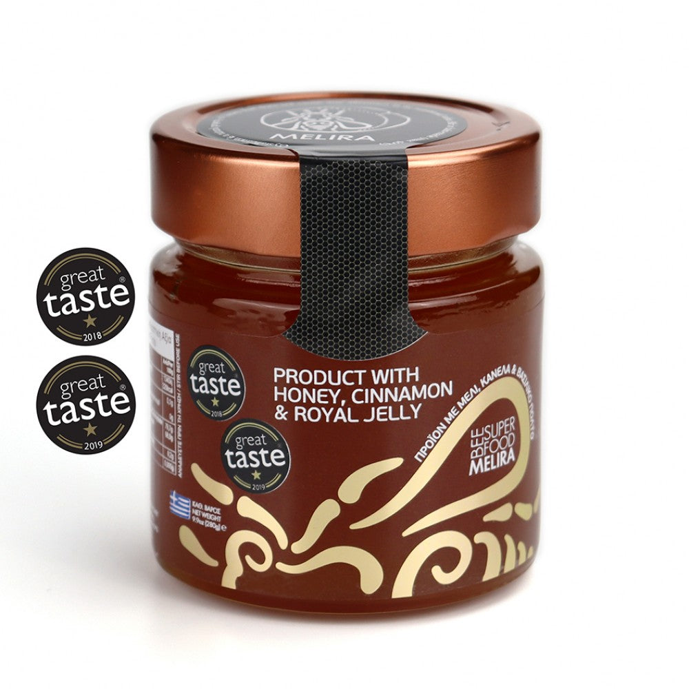 An image of a jar of premium Forest Honey infused with the warm essence of Cinnamon and enriched with the luxurious addition of Royal Jelly. The jar sits against a backdrop of a lush forest scene, evoking the natural origins of the ingredients. The label showcases the golden hues of honey, the rustic brown tones of cinnamon sticks, and a subtle hint of opulence with the depiction of royal jelly.
